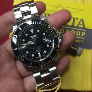 Invicta watch pro diver Swiss SS black 5017 $350